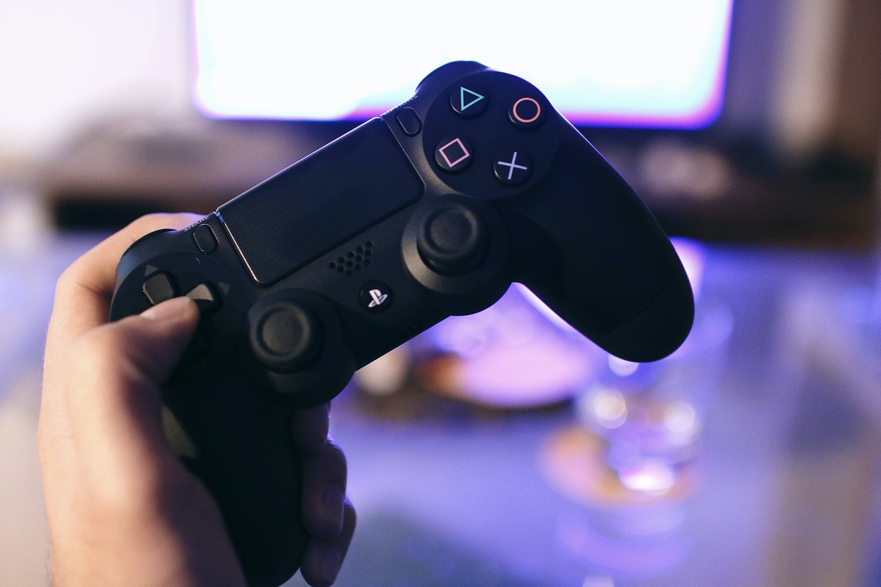 Photo by JÉSHOOTS: https://www.pexels.com/photo/person-holding-sony-ps4-dualshock-4-21067/