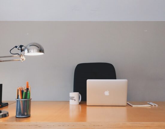 Photo by Pixabay: https://www.pexels.com/photo/silver-apple-macbook-on-brown-wooden-table-265072/