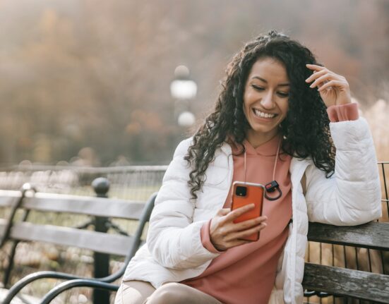 Photo by Keira Burton: https://www.pexels.com/photo/cheerful-latin-american-woman-with-smartphone-6146957/