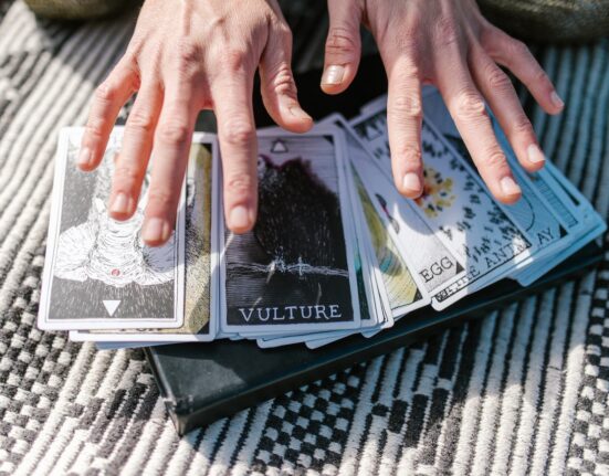Photo by RODNAE Productions: https://www.pexels.com/photo/person-holding-black-and-white-cd-case-6806599/
