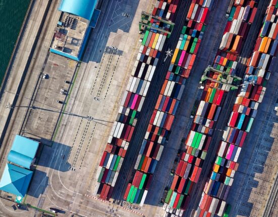 Photo by Tom Fisk: https://www.pexels.com/photo/aerial-view-photography-of-container-van-lot-1427107/