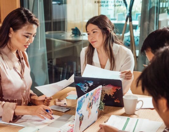 Photo by Kindel Media: https://www.pexels.com/photo/a-group-of-people-having-a-meeting-in-the-office-7651753/