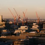 Photo by Olga Lioncat: https://www.pexels.com/photo/modern-buildings-under-constructions-in-city-7245333/